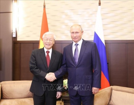 Tổng thống Liên bang Nga Vladimir Putin đón Tổng Bí thư Nguyễn Phú Trọng. (Ảnh: Trí Dũng - TTXVN)