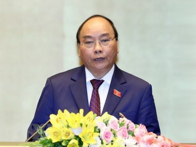 Thủ tướng Chính phủ Nguyễn Xuân Phúc trình bày Báo cáo về tình hình kinh tế-xã hội năm 2018 và kế hoạch phát triển kinh tế-xã hội năm 2019.